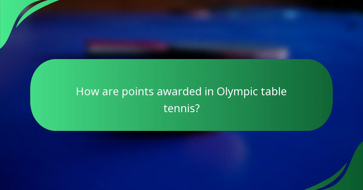 How are points awarded in Olympic table tennis?
