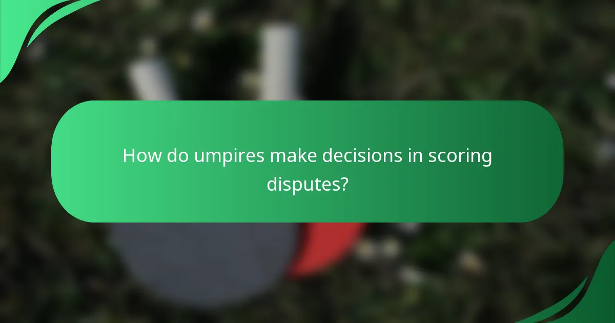 How do umpires make decisions in scoring disputes?