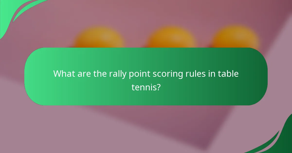 What are the rally point scoring rules in table tennis?