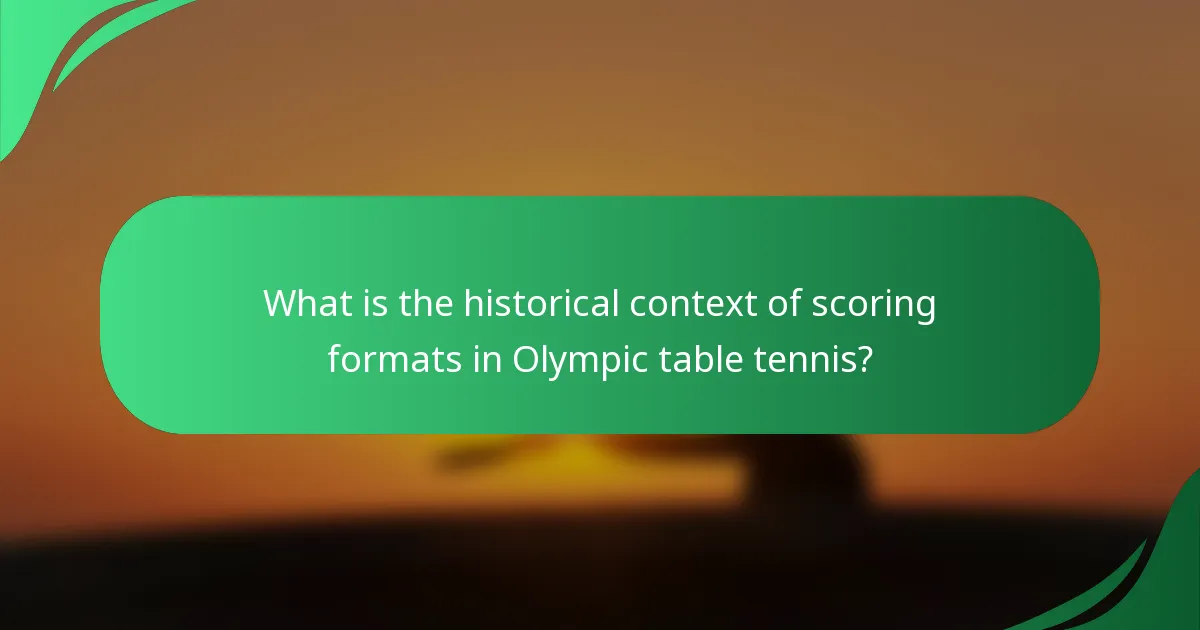 What is the historical context of scoring formats in Olympic table tennis?